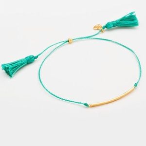 Gorgana Gold Bar Bracelet turquoise tassel detail